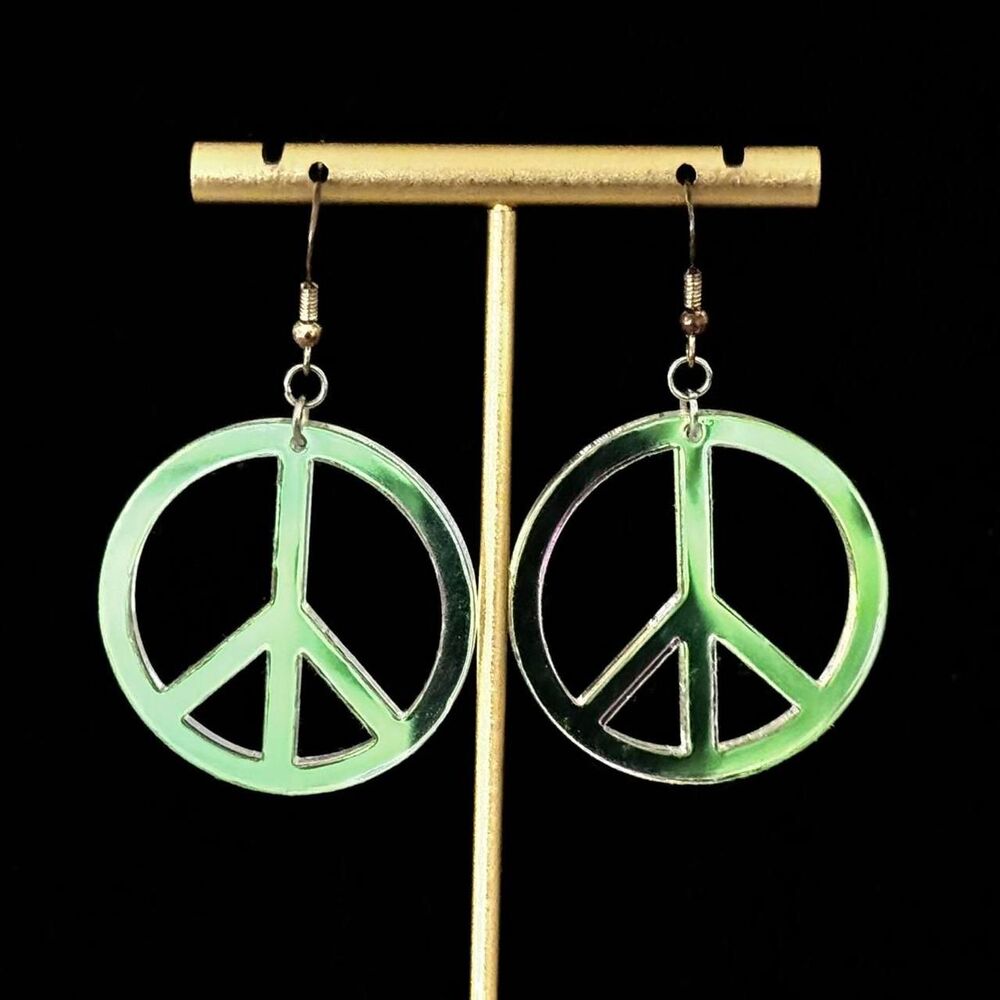 Y2K style peace sign earrings.